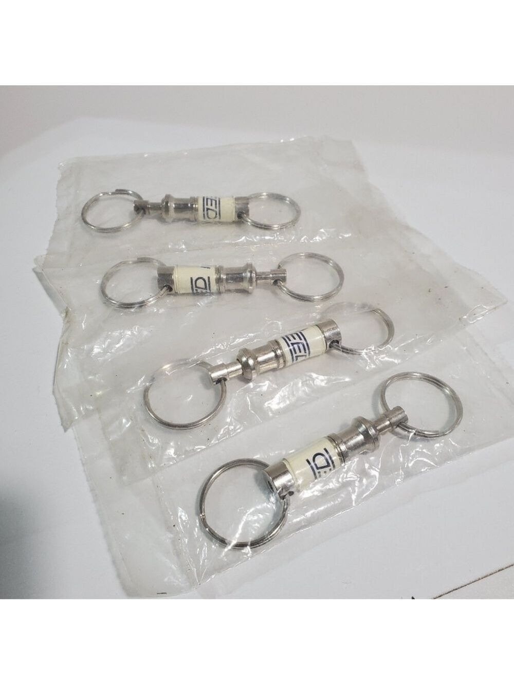 Sealed Lot of 4 REED quick release keychains advertising star RReed